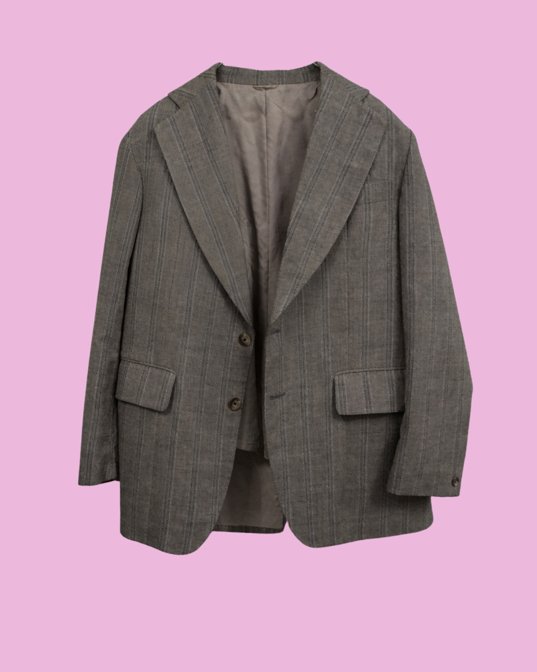 Grey pinstripe blazer with notched lapels, flap pockets and brown buttons